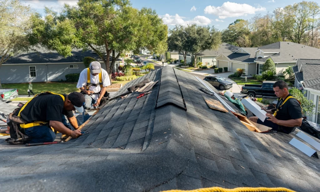 Westfall Roofing team performing roof repairs on a residential home in Sarasota